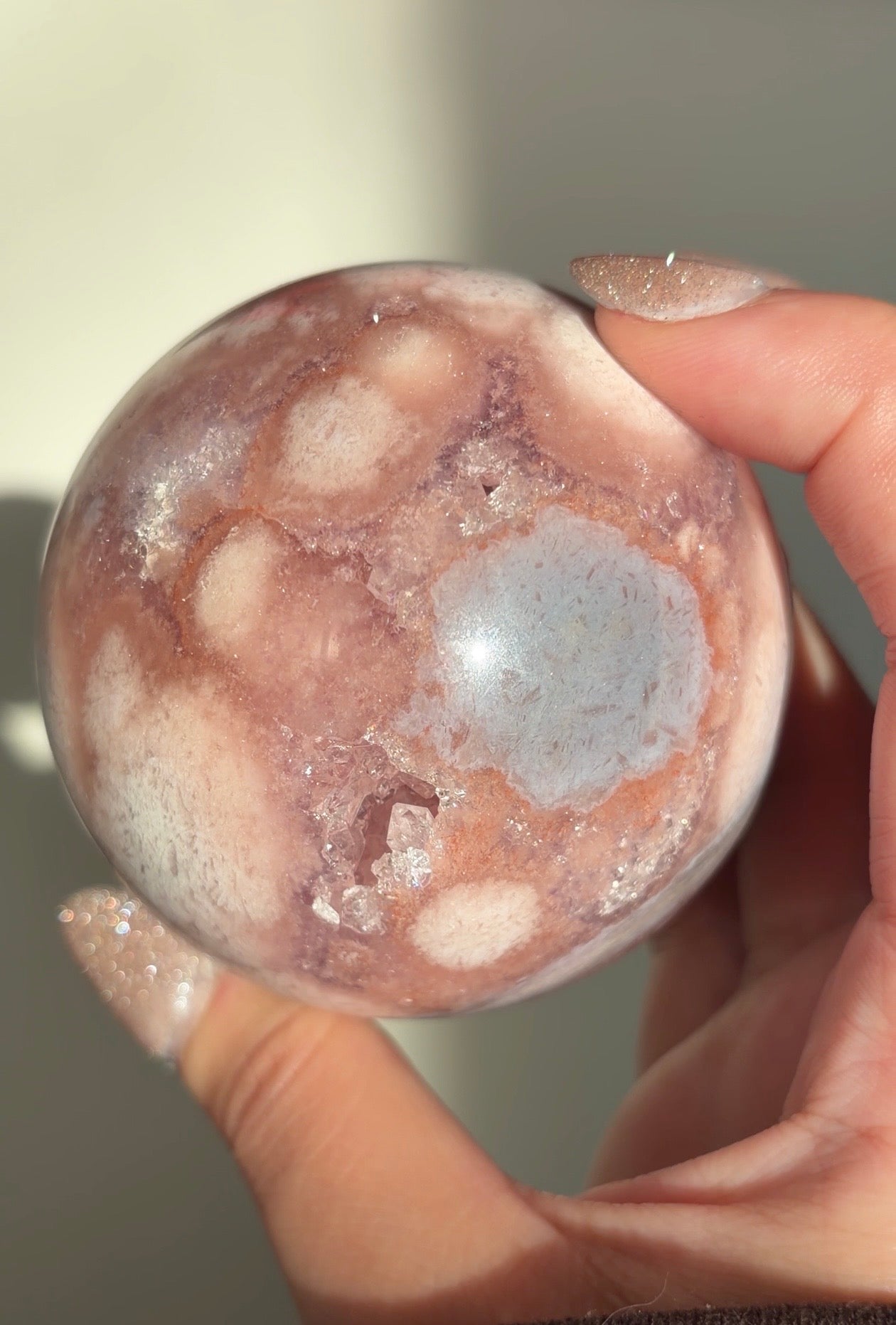 Pink amethyst and orbicular blue flower agate sphere